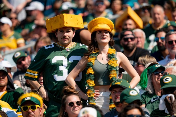 JACKSONVILLE, FL - OCTOBER 27:Green Bay Packers fans don their cheese heads during a NFL, American Football Herren, USA football game between the Green Bay Packers and the Jacksonville Jaguars on Octo ...
