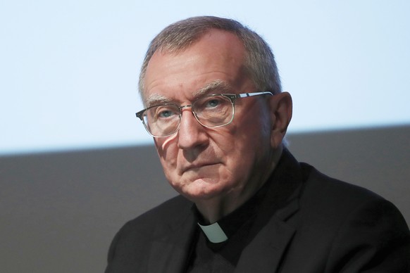 FILE - Cardinal Pietro Parolin attends at the 150th anniversary of the arrival of Catholic missionaries in China from an Italian religious order meeting, in Milan, Italy, on Oct. 3, 2020. (AP Photo/An ...