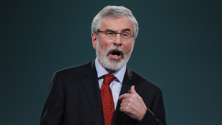 epa06337973 Sinn Fein President Gerry Adams delivers a speech during the 2017 Sinn Fein Ard Fheis annual party conference in Dublin, Ireland, 18 November 2017. Adams announced his retirement as leader ...