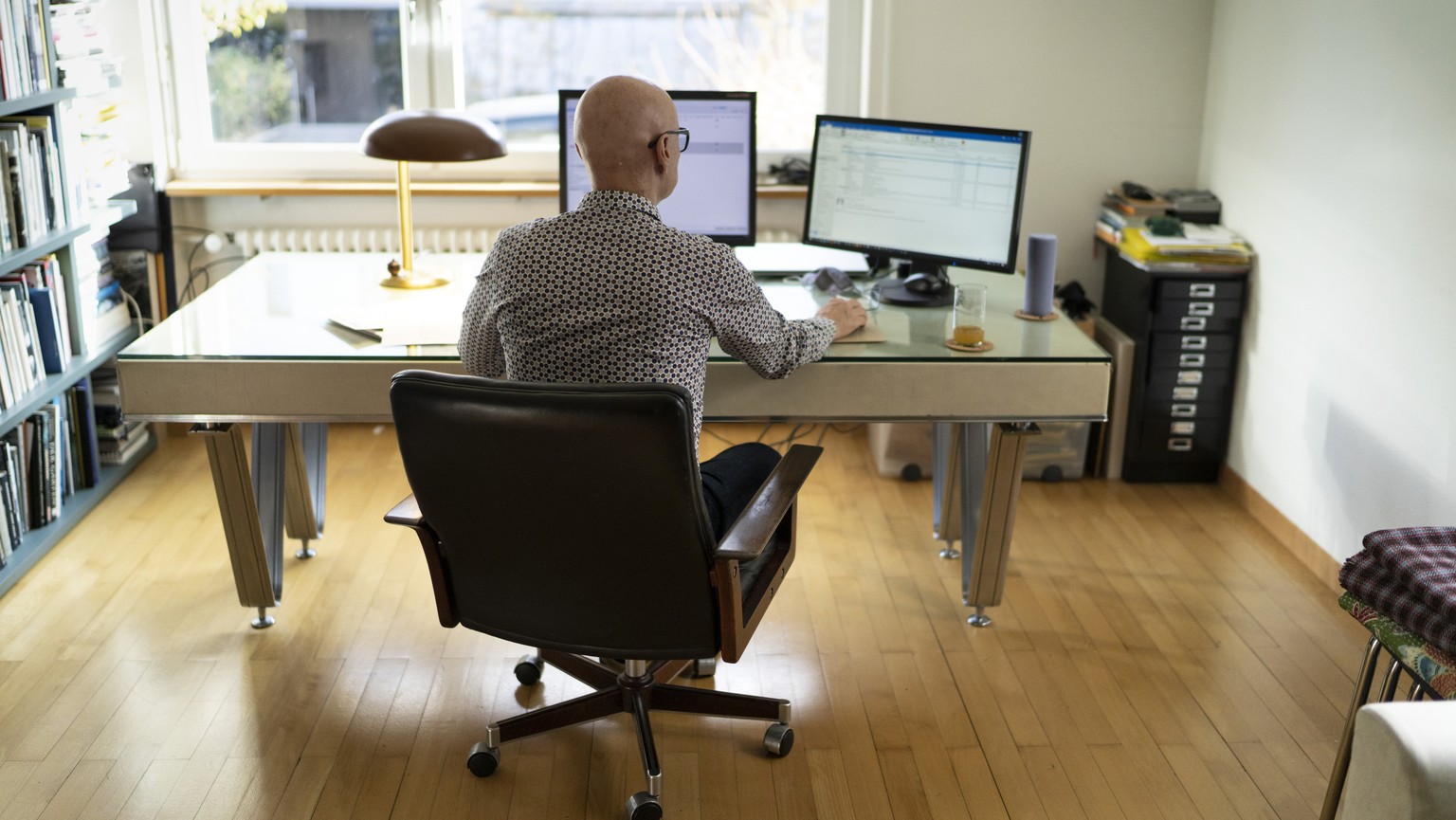 ZUM THEMATIK ARBEITEN IM HOME-OFFICE ALS SCHUTZMASSNAHME WAEHREND DER CORONA-PANDEMIE STELLEN WIR IHNEN FOLGENDES NEUES BILD ZUR VERFUEGUNG. WEITERE BILDER FINDEN SIE AUF visual.keystone-sda.ch --- Ei ...