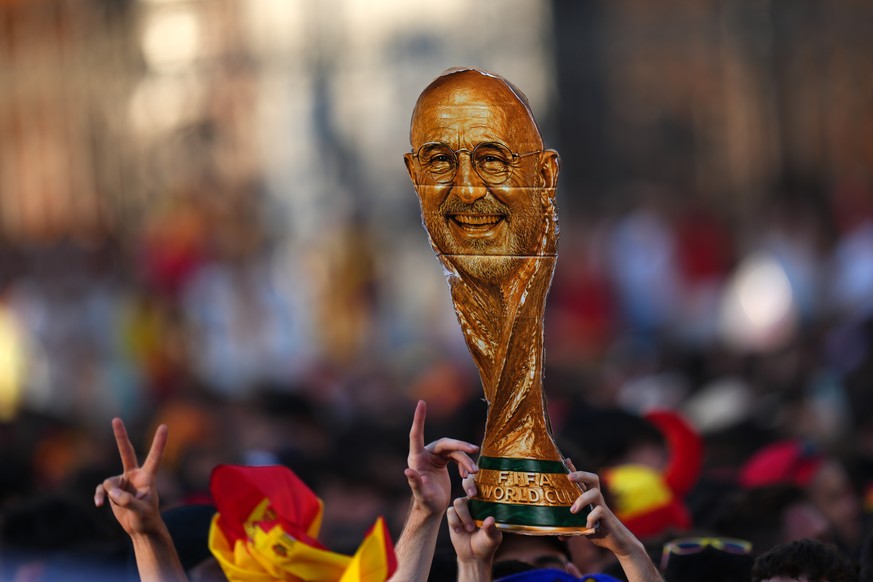 Fans wait for the arrival of players from Spain's national soccer team during celebrations in Madrid on Monday, July 20, 2026, after Spain defeated Argentina in the World Cup final in East Ruther ...
