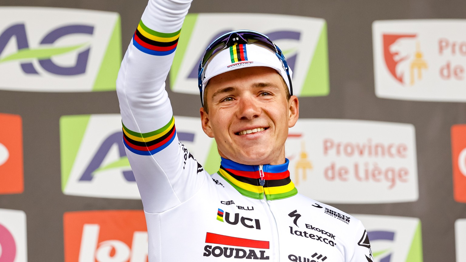 epa10587880 Winner Remco Evenepoel of team Soudal-Quick Step celebrates on the podium after winning the Liege-Bastogne-Liege cycling race over 258,5km, in Liege, Belgium, 23 April 2023. EPA/JULIEN WAR ...