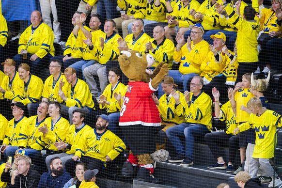The mascot Cooly performs with Sweden's fans, during the 2026 IIHF Men's Ice Hockey World Championship preliminary round group B game between Denmark and Sweden, at the BCF Arena ice hockey  ...