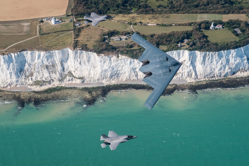 epa07804028 A handout photo made available by the British Royal Air Force (RAF) on 30 August 2019 shows a United States Air Force B2 Spirit, currently deployed to RAF Fairford in Gloucestershire, flyi ...