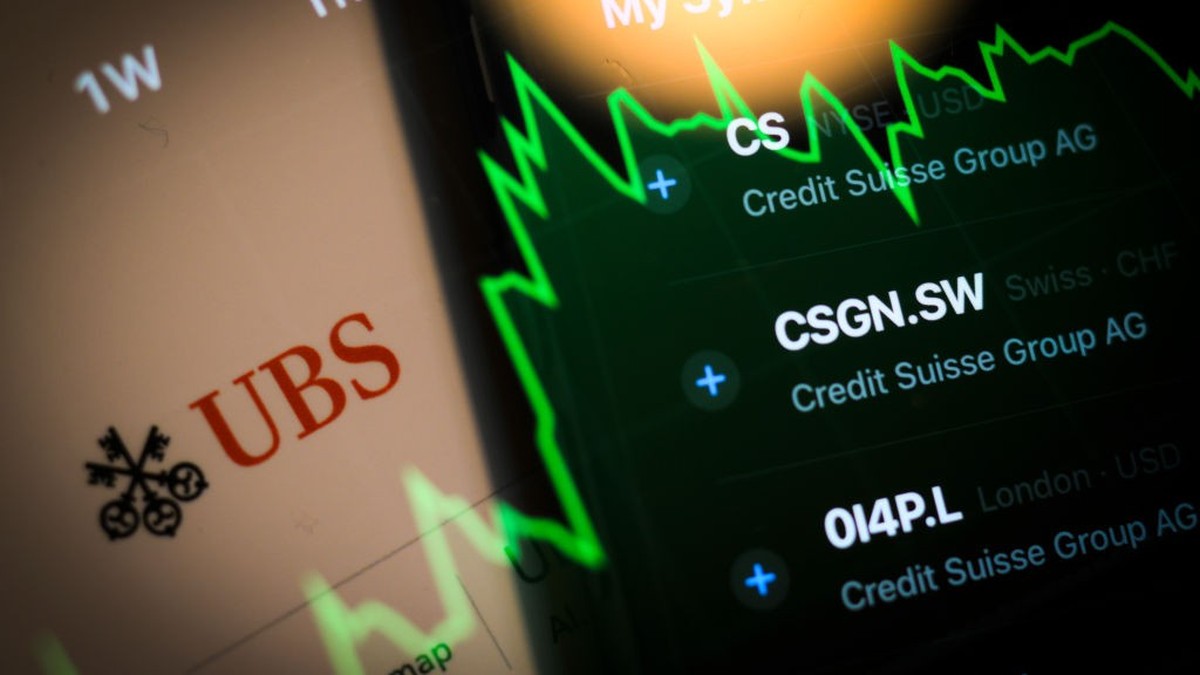The Credit Suisse and UBS bank logos are seen in this photo illustration in Warsaw, Poland on 21 March, 2023. According to Opimas CEO Octavio Marenzi Switzerland's standing as a financial centre  ...