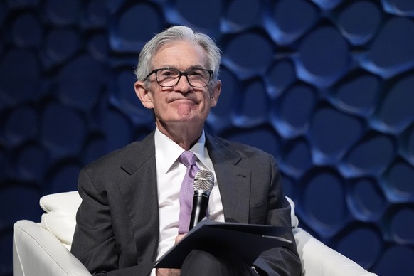 Federal Reserve Chair Jerome Powell reacts to a question about serving past his term from moderator Catherine Rampell during an event in Music Hall at Fair Park Thursday, Nov. 14, 2024, in Dallas. (AP ...