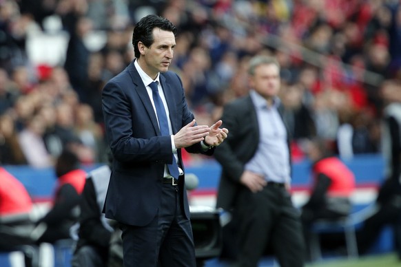 PSG headcoach Unai Emery reacts after PSG&#039;s Thomas Meunier scored a goal during the French League One soccer match between Paris Saint-Germain and Metz at the Parc des Princes Stadium, in Paris,  ...