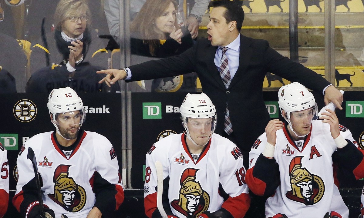 Ottawa Senators head coach Guy Boucher gives instructions during the third period in game six of a first-round NHL hockey Stanley Cup playoff series against the Boston Bruins, Sunday, April 23, 2017,  ...