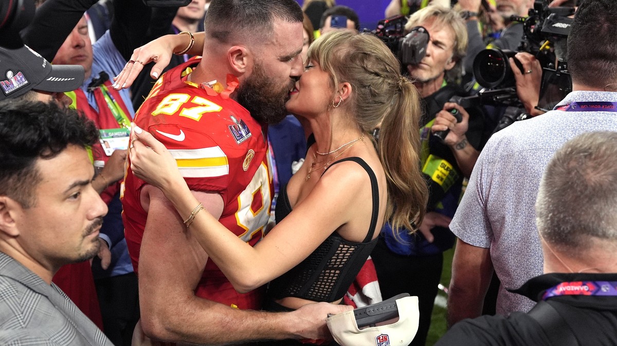 Taylor Swift kisses Kansas City Chiefs tight end Travis Kelce after the NFL Super Bowl 58 football game against the San Francisco 49ers, Sunday, Feb. 11, 2024, in Las Vegas. The Chiefs won 25-22. (AP  ...