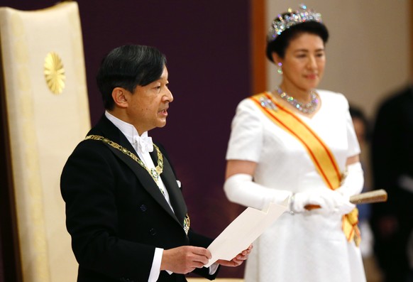 Japan&#039;s new Emperor Naruhito, accompanied by new Empress Masako, makes his first address during a ritual after succeeding his father Akihito at Imperial Palace in Tokyo, Wednesday, May 1, 2019. ( ...