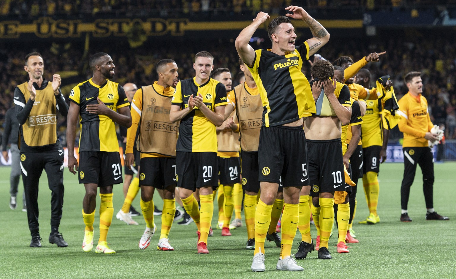 Young Boys' Cedric Zesiger, center, celebrates with teammates after winning the UEFA Champions League group F soccer match between BSC Young Boys and Manchester United, on Tuesday, September 14, 2021  ...
