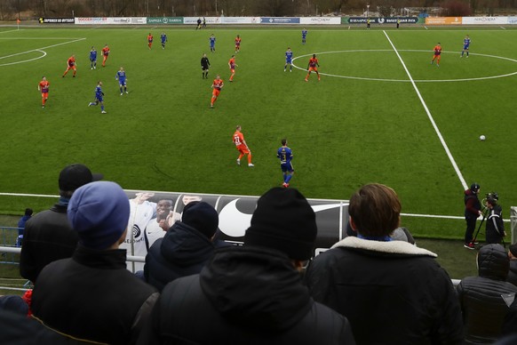 In this photo taken on Thursday, March 19, 2020, football fans watch the Belarus Championship soccer match between Energetik-BGU and Bate in Minsk, Belarus. Almost all of Europe has suspended soccer g ...