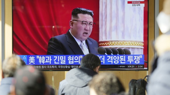 FILE - A TV screen shows a news program reporting with footage of North Korean leader Kim Jong Un in Pyongyang, at the Seoul Railway Station in Seoul, South Korea, on Dec. 27, 2022. South Korea?s mili ...