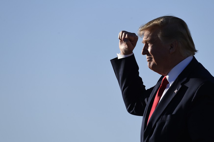 President Donald Trump walks down the steps of Air Force One at Austin-Bergstrom International Airport in Austin, Texas, Sunday, Jan. 19, 2020. Trump is in Austin to speak at the American Farm Bureau  ...