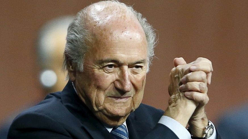FIFA President Sepp Blatter gestures after he was re-elected at the 65th FIFA Congress in Zurich, Switzerland, in this May 29, 2015 file photo. Blatter faces a 90 day suspension from football if the g ...