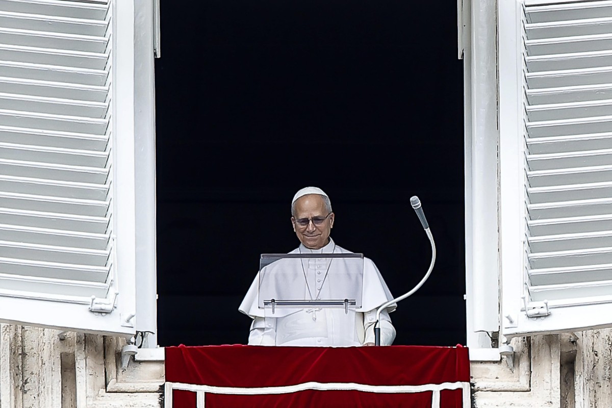 epa12821126 Pope Leo XIV leads the Angelus prayer, traditional Sunday's prayer, from the window of his office overlooking Saint Peter's Square, Vatican City, 15 March 2026. EPA/ANGELO CARCON ...