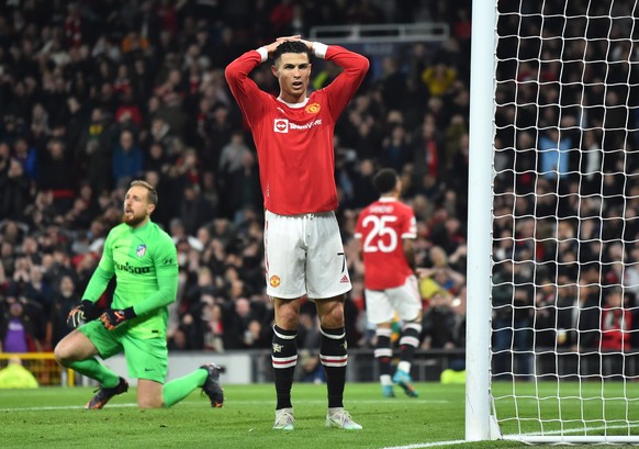 epa09827502 Manchester United&#039;s Cristiano Ronaldo reacts during the UEFA Champions League round of 16, second leg soccer match between Manchester United and Atletico Madrid in Manchester, Britain ...