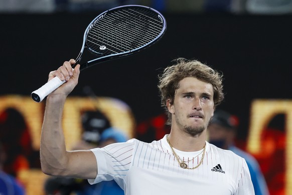 Alexander Zverev of Germany reacts after defeating compatriot Daniel Altmaier in their first round match at the Australian Open tennis championships in Melbourne, Australia, Monday, Jan. 17, 2022. (AP ...