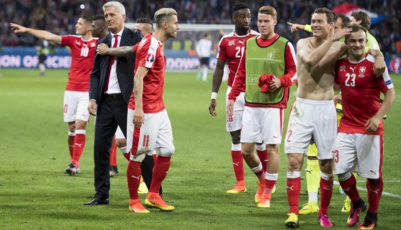 Swiss head coach Vladimir Petkovic, Valon Behrami, Johan Djourou, Nico Elvedi, Stephan Lichtsteiner, and Xherdan Shaqiri, from left to right, react during the UEFA EURO 2016 group A preliminary round  ...