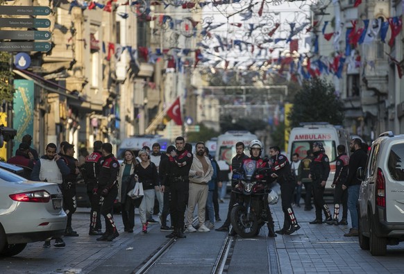 Security and ambulances at the scene after an explosion on Istanbul&#039;s popular pedestrian Istiklal Avenue, Sunday, Nov. 13, 2022. An explosion on one of Istanbul&#039;s most popular pedestrian tho ...