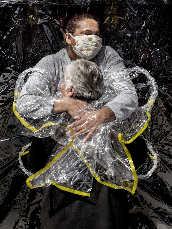 In this image released by World Press Photo, Thursday April 15, 2021, by Mads Nissen, Politiken, Panos Pictures, which won the World Press Photo of the Year award, and the first prize in the General N ...