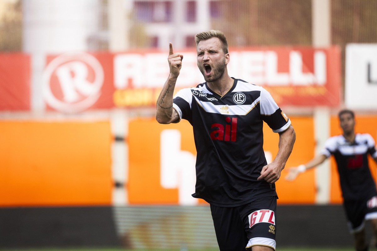 Kacper Przybylko (LUG) feiert das Tor zum 1:1, waehrend des Super League Fussballspiels FC Lugano gegen FC St. Gallen, im Cornaredo-Stadion in Lugano, Sonntag, 01. September 2024. (KEYSTONE/Ti-Press/A ...