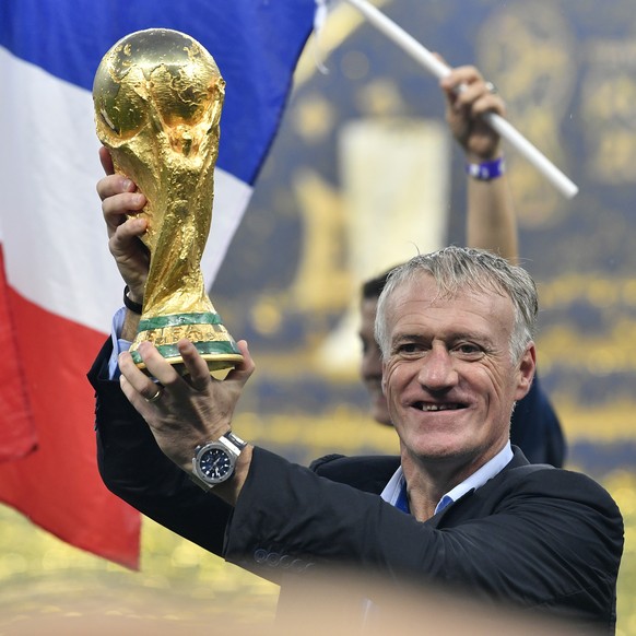 France head coach Didier Deschamps lifts the trophy after France beat Croatia by 4-2 during the final match between France and Croatia at the 2018 soccer World Cup in the Luzhniki Stadium in Moscow, R ...