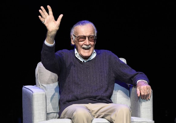 FILE - In this Aug. 22, 2017, file photo, comic book writer Stan Lee waves to the audience after being introduced onstage at the &quot;Extraordinary: Stan Lee&quot; tribute event at the Saban Theatre  ...