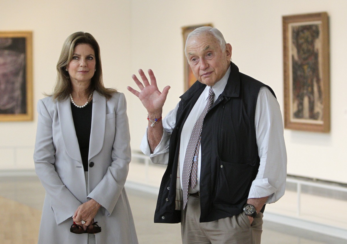 In this Sept. 19, 2014 file photo, retail mogul Leslie Wexner, right, and his wife Abigail tour the "Transfigurations" exhibit at the Wexner Center for the Arts in Columbus, Ohio. The retail ...