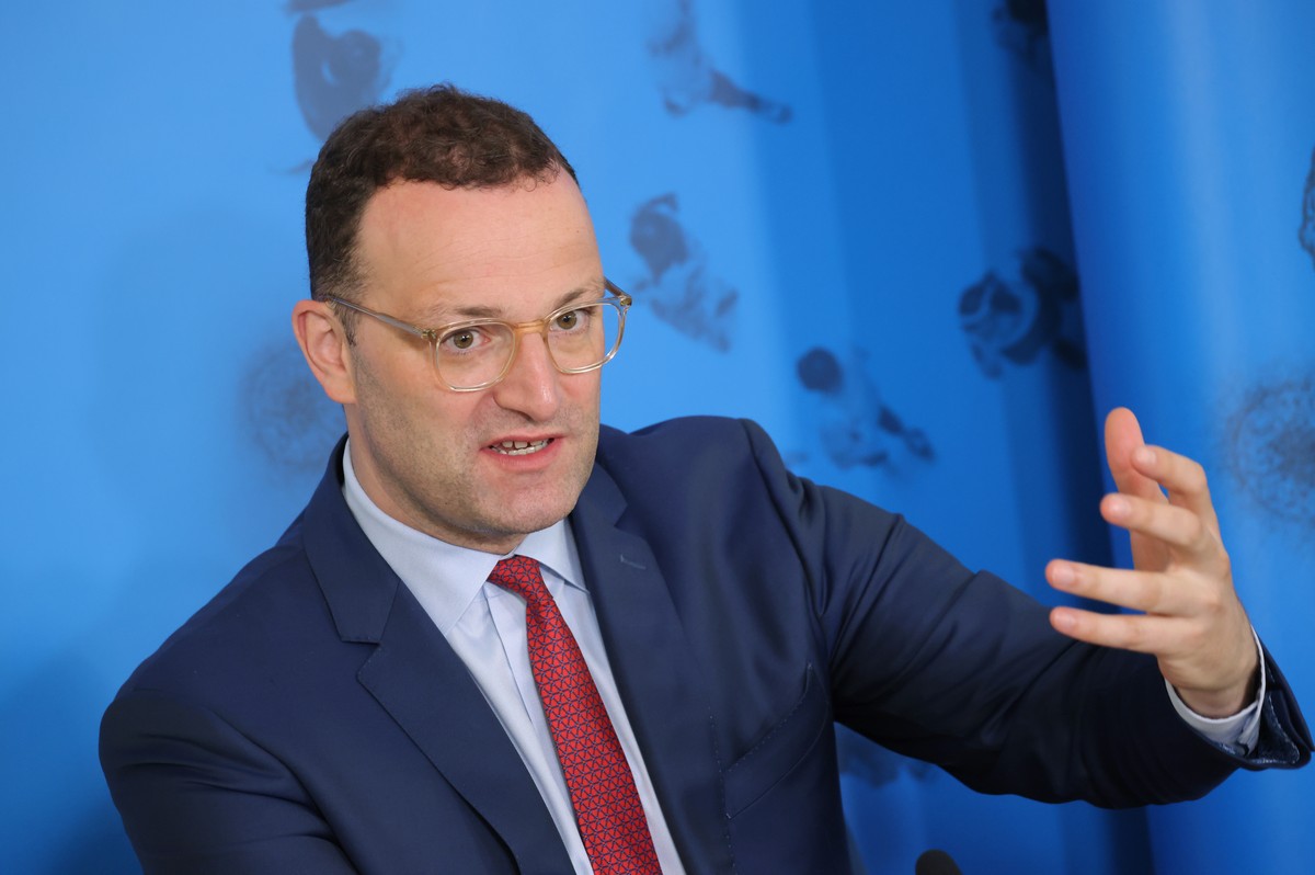 epa09341757 Germany's Federal Health Minister Jens Spahn speaks to the media during a visit by German Chancellor Merkel to the Robert Koch Institute, in Berlin, Germany, 13 July 2021. The Robert  ...