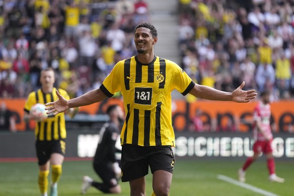 Dortmund&#039;s Sebastien Haller celebrates after scoring his side&#039;s second goal during the German Bundesliga soccer match between FC Augsburg and Borussia Dortmund at the WWK Arena in Augsburg,  ...