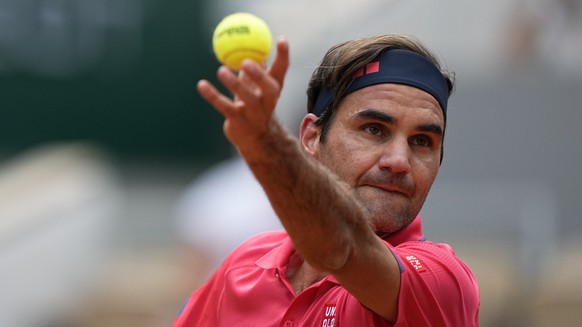 Switzerland&#039;s Roger Federer serves to Croatia&#039;s Marin Cilic for their second round match on day 5, of the French Open tennis tournament at Roland Garros in Paris, France, Thursday, June 3, 2 ...
