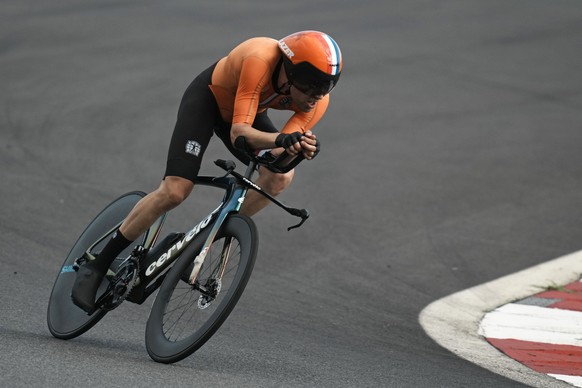 Tom Dumoulin of The Netherlands competes during the men's cycling individual time trial at the 2020 Summer Olympics, Wednesday, July 28, 2021, in Oyama, Japan. (AP Photo/Thibault Camus)