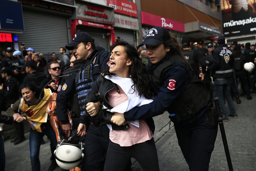 Police arrest demonstrators as they march during May Day, in Istanbul, Monday, May 1, 2017. Security forces prevented leftist groups trying to reach city&#039;s iconic Taksim Square to celebrate May D ...