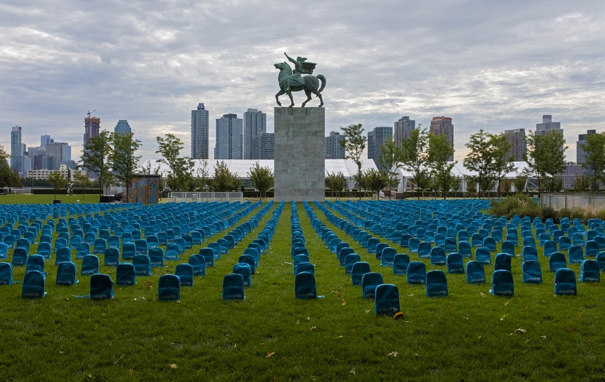 Thousands of school backpacks are laid out in an installation on the North Lawn of the United Nations Sunday, Sept. 8, 2019. The installation, created by UNICEF, illustrates the scale of child deaths ...