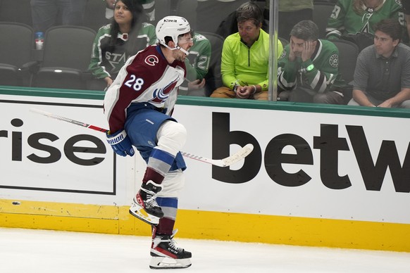 Colorado Avalanche left wing Miles Wood (28) celebrates after scoring in overtime in Game 2 of an NHL hockey Stanley Cup second-round playoff series against the Dallas Stars in Dallas, Tuesday, May 7, ...