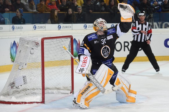 epa05692237 Luganos goalkeeper Elvis Merzlikins during the game between Switzerlands HC Lugano and Switzerlands HC Davos at the 90th Spengler Cup ice hockey tournament in Davos, Switzerland, 30 Decemb ...