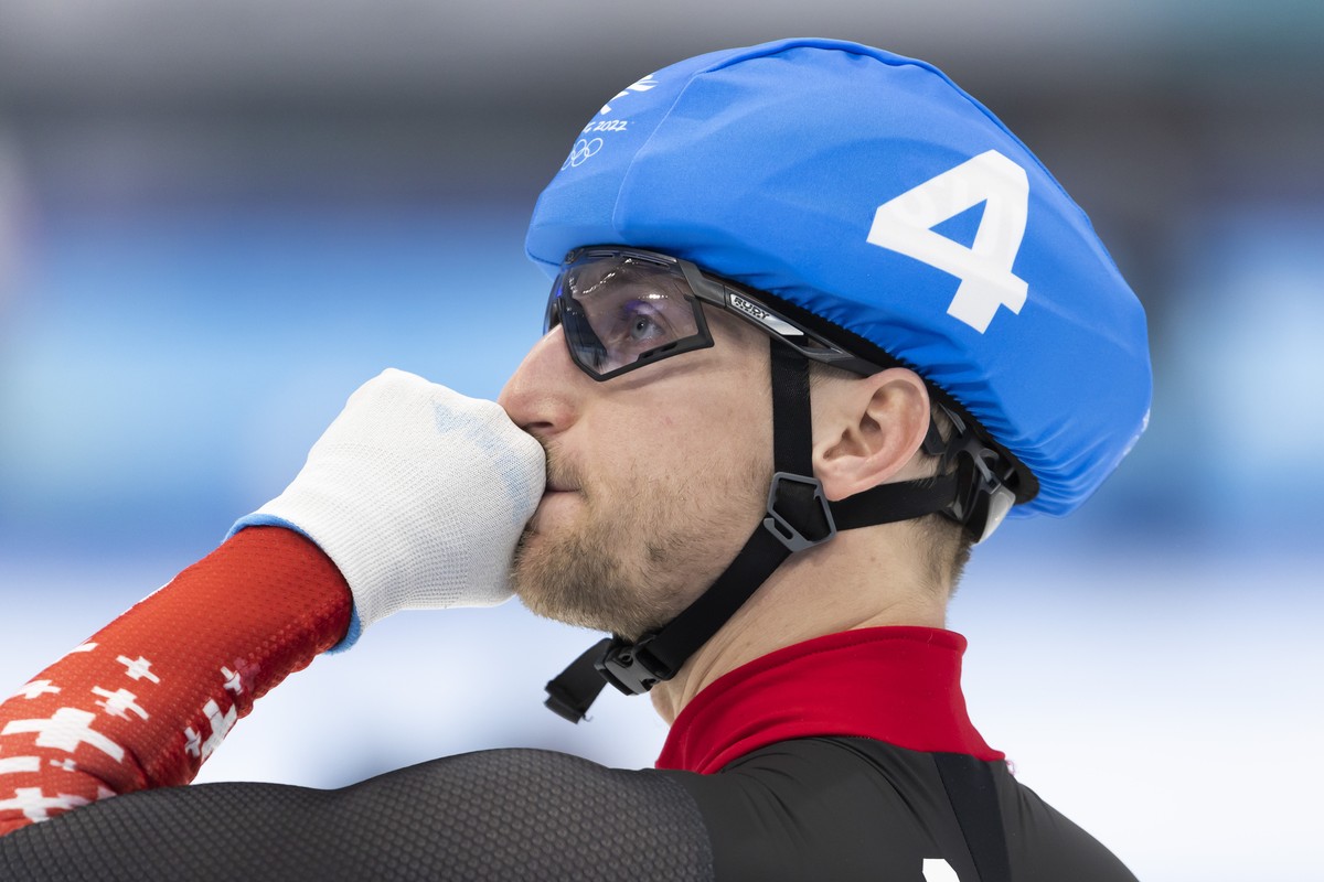 Switzerland's Livio Wenger reacts during the men's Speed Skating Mass Start semifinal at the 2022 Winter Olympics in Beijing, China, on Saturday, February 19, 2022. (KEYSTONE/Salvatore Di No ...
