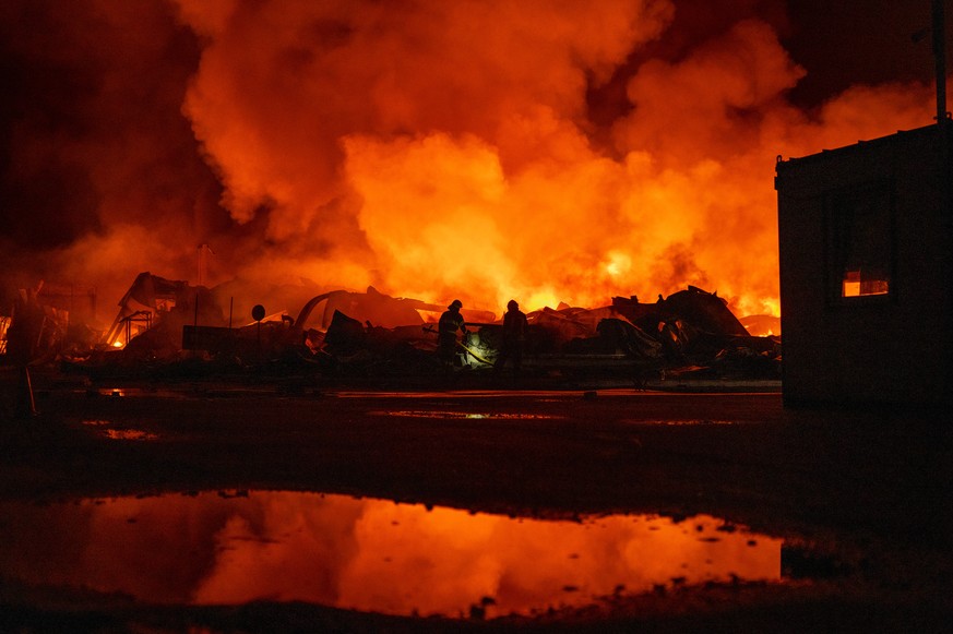 Firefighters put out a fire after Russian missiles hit a warehouse in Kyiv, Ukraine, Wednesday, Aug. 5, 2026. (AP Photo/Dan Bashakov)
APTOPIX Russia Ukraine War