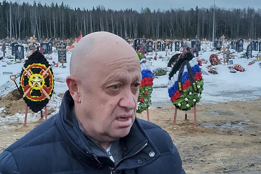 FILE - Wagner Group head Yevgeny Prigozhin attends the funeral of Dmitry Menshikov, a fighter of the Wagner group who died during a special operation in Ukraine, at the Beloostrovskoye cemetery outsid ...