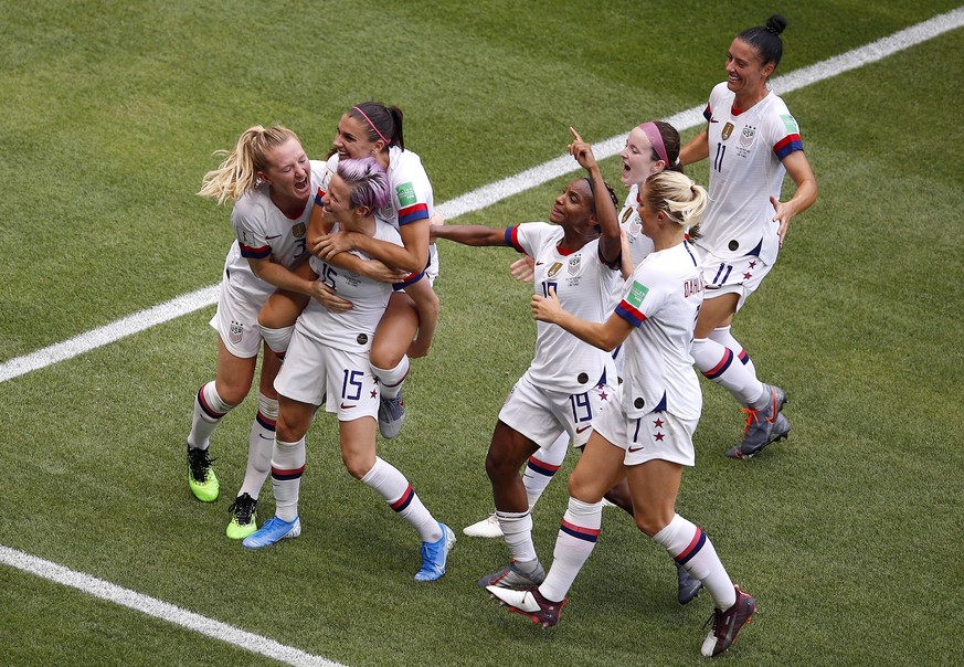 United States&#039; Megan Rapinoe, second from left, celebrates with teammates after scoring her side&#039;s first goal by penalty during the Women&#039;s World Cup final soccer match between US and T ...