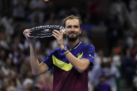 Daniil Medvedev, of Russia, poses for photographs after losing to Novak Djokovic, of Serbia, in the men&#039;s singles final of the U.S. Open tennis championships, Sunday, Sept. 10, 2023, in New York. ...
