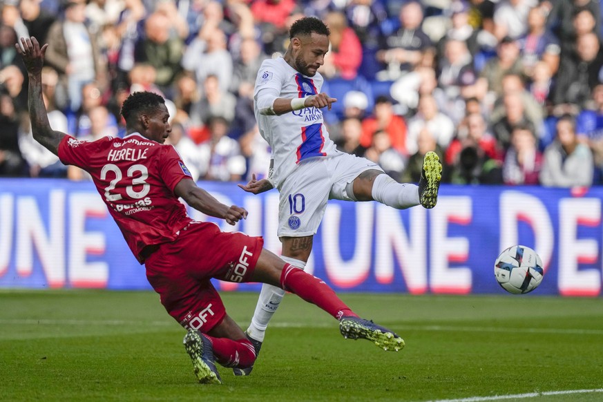 PSG&#039;s Neymar, right, scores his side&#039;s first goal during the French League One soccer match between Paris Saint-Germain and Brest at the Parc des Princes in Paris, Saturday, Sept. 10, 2022.  ...