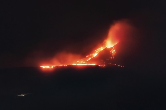Mount Etna volcano spews lava during an eruption, in the early hours of Monday, Dec. 14, 2020. Mount Etna in Sicily has roared back into spectacular volcanic action, sending up plumes of ash and spewi ...