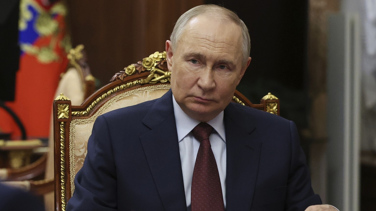 Russian President Vladimir Putin listens to Russian Academy of Sciences President Gennady Krasnikov during their meeting at the Kremlin in Moscow, Russia, Tuesday, July 15, 2025. (Mikhail Metzel, Sput ...