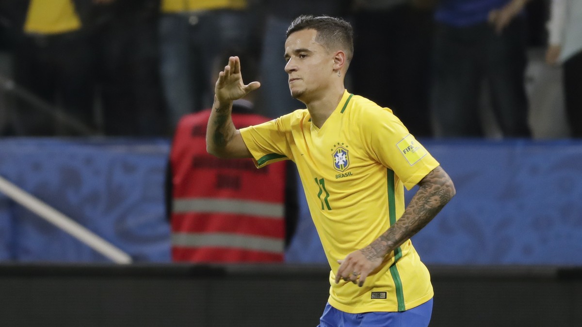 Brazil's Philippe Coutinho celebrates scoring his side's first goal against Paraguay during their 2018 World Cup qualifying soccer match at the Arena Corinthians Stadium in Sao Paulo, Brazil ...