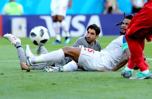 epa06819100 Roman Torres of Panama (R) looks on after clearing the ball during the FIFA World Cup 2018 group G preliminary round soccer match between Belgium and Panama in Sochi, Russia, 18 June 2018. ...