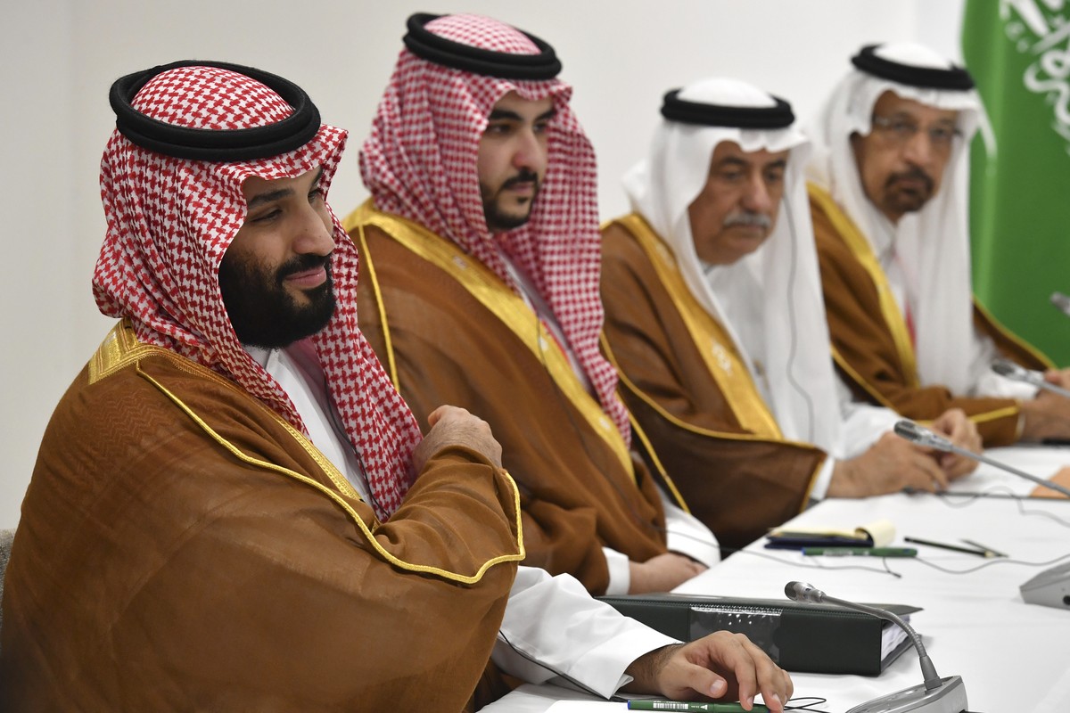 Saudi Arabia's Crown Prince Mohammed bin Salman, left, holds a bilateral meeting with Russia's President Vladimir Putin on the sidelines of the G-20 Summit in Osaka, western Japan Saturday,  ...