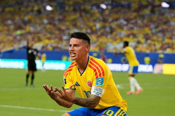 Colombia's James Rodriguez (10) reacts during the World Cup Group K soccer match between Colombia and Portugal in Miami Gardens, Fla., Saturday, June 27, 2026. (AP Photo/Lynne Sladky)
James Rodri ...