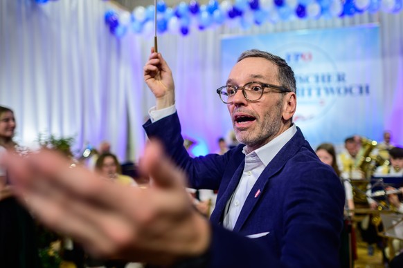 epa11153520 Herbert Kickl, leader of the right-wing Austrian Freedom Party (FPOe), conducts an orchestra during the party&#039;s traditional political Ash Wednesday meeting in Ried im Innkreis, Austri ...